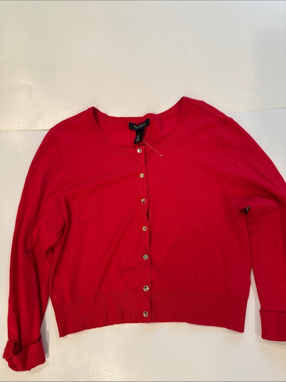 White House Black Market red light cardigan, size Medium, unique snaps and cuff.